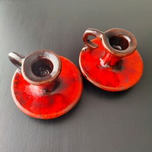 2 vintage Evangeline red drip glaze pottery candlestick holders (Canuck)